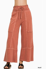 Load image into Gallery viewer, Exposed-seam Flare Hem Pants With Pockets