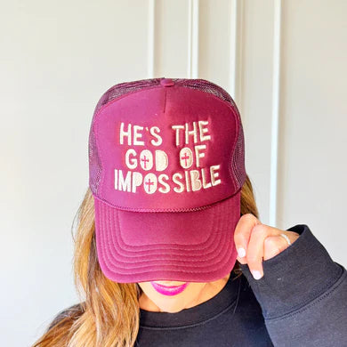 Maroon He's The God of Impossible Trucker Hat